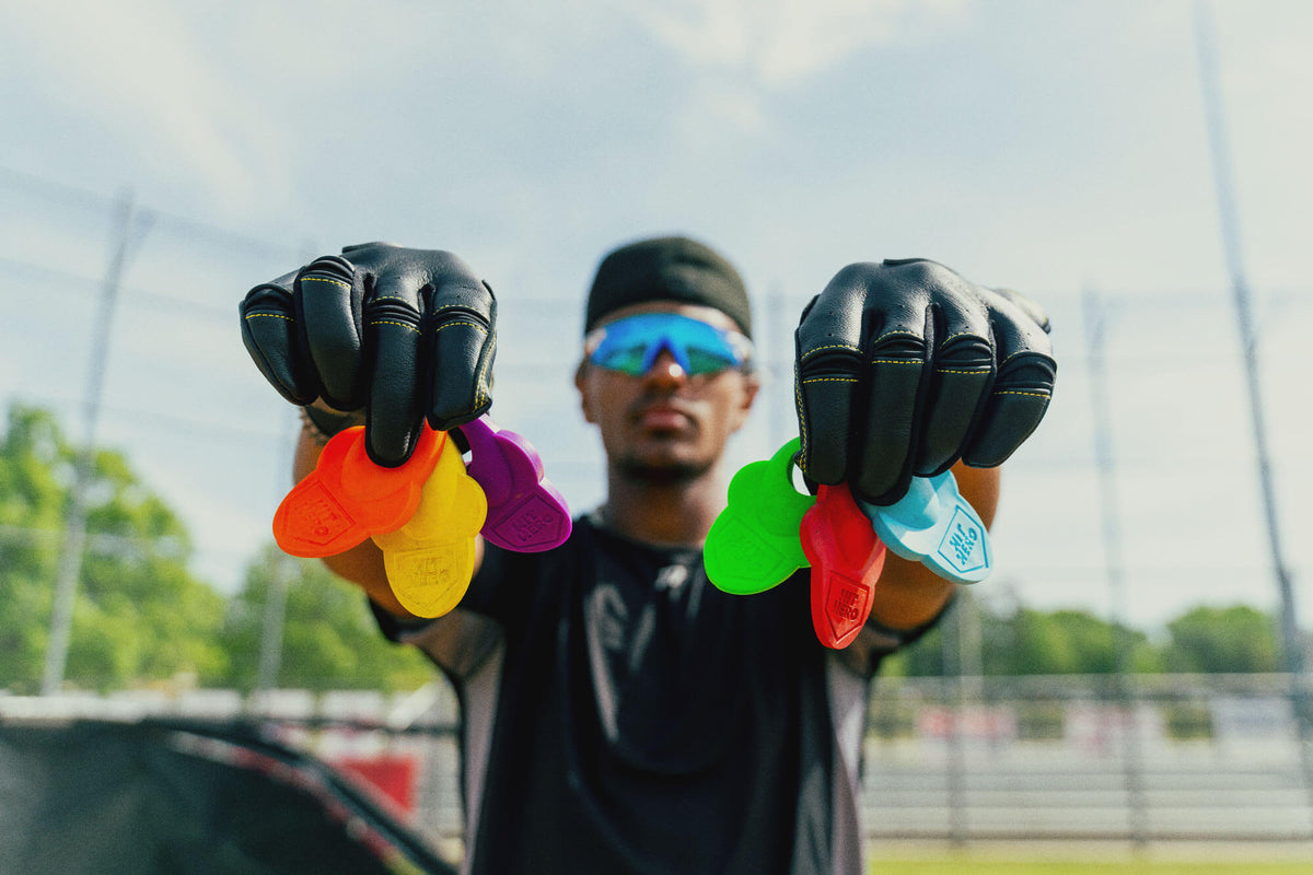 Hit Hero baseball thumb guards held up in every color