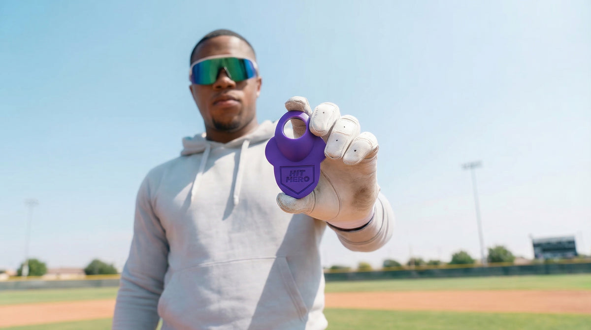 Person holding a purple hit hero
